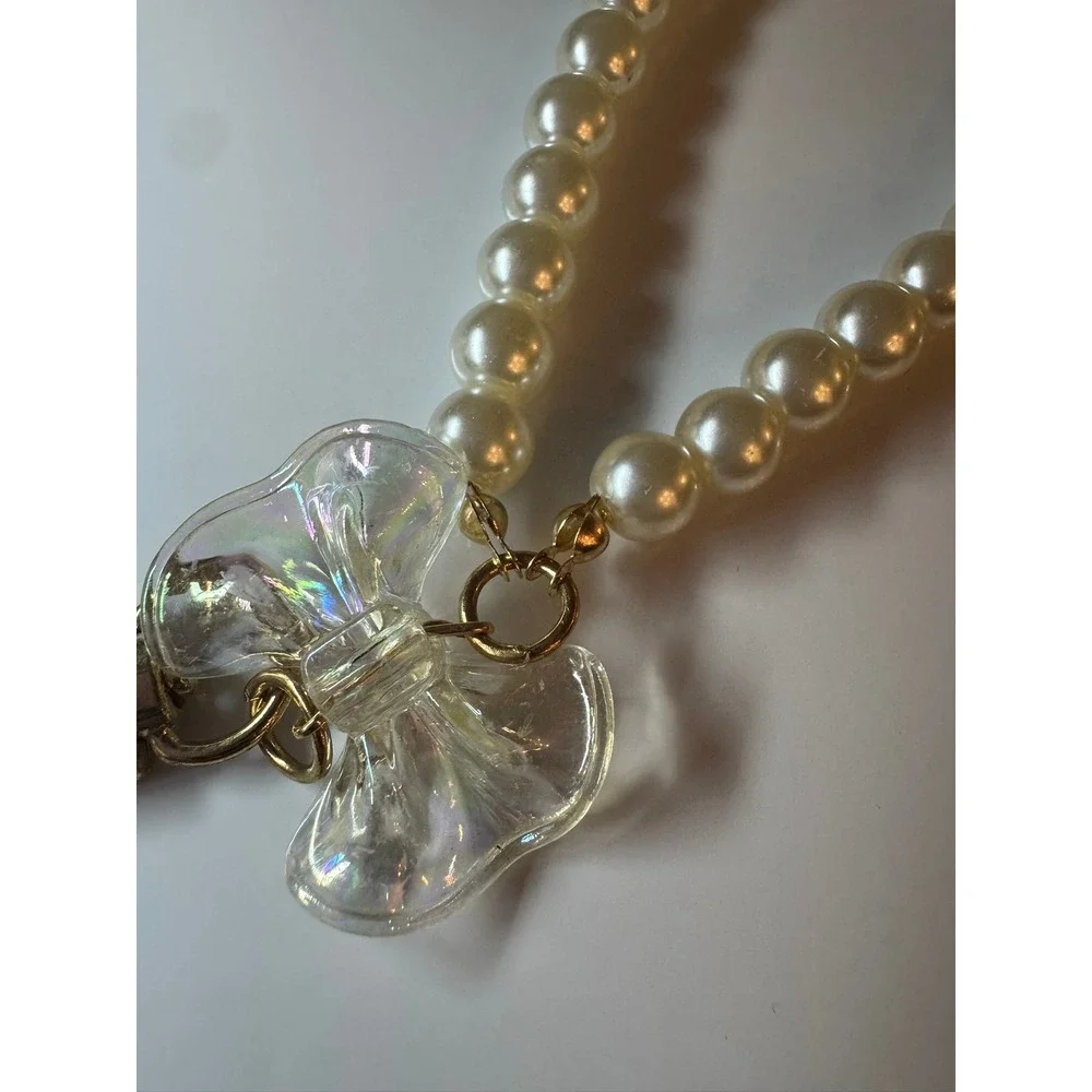 Faux Pearl Wristlet Keychain with Iridescent Bow Charm Gold‎ Tone Hardware Cream
